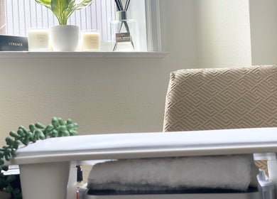 Cozy nail artist corner at Kandyse Faye in Wellingborough, England, GB, featuring decor and comfortable seating.