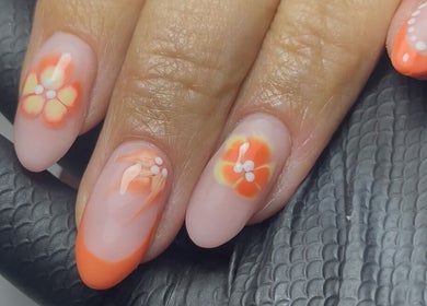 Floral nail art by Kandyse Faye | Nail Artist in Wellingborough, England, GB, showcasing a vibrant orange design.