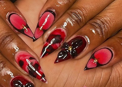 Stunning red and black nail art at Terina's Nail Studio, Kingstown, St. George, VC.