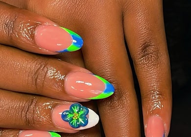 Bright floral nail art at Terina's Nail Studio, Kingstown, St. George, VC, showcasing vibrant creativity.