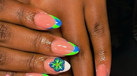Bright floral nail art at Terina's Nail Studio, Kingstown, St. George, VC, showcasing vibrant creativity.