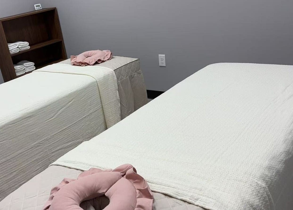 Cozy massage room at You You Spa, Saint Paul, Minnesota. Relaxing ambiance for ultimate comfort.