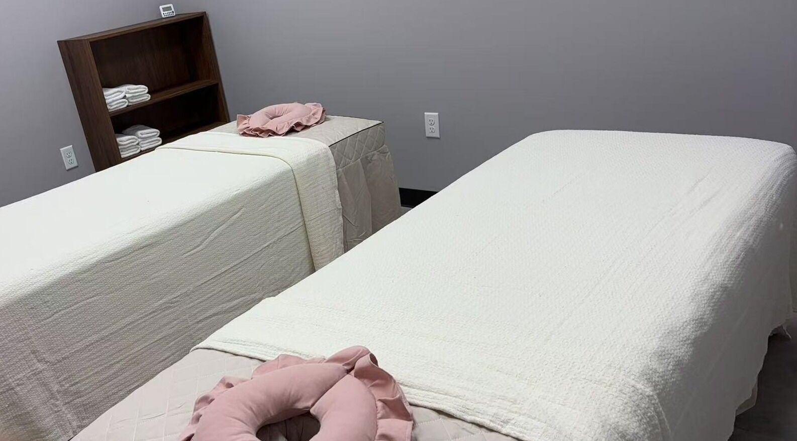 Cozy massage room at You You Spa, Saint Paul, Minnesota. Relaxing ambiance for ultimate comfort.