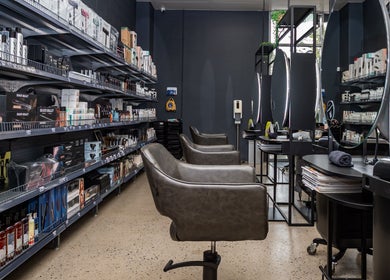Modern seating and shelves at ATSI Hair Supplies in Brookvale, New South Wales, AU showcasing beauty products.