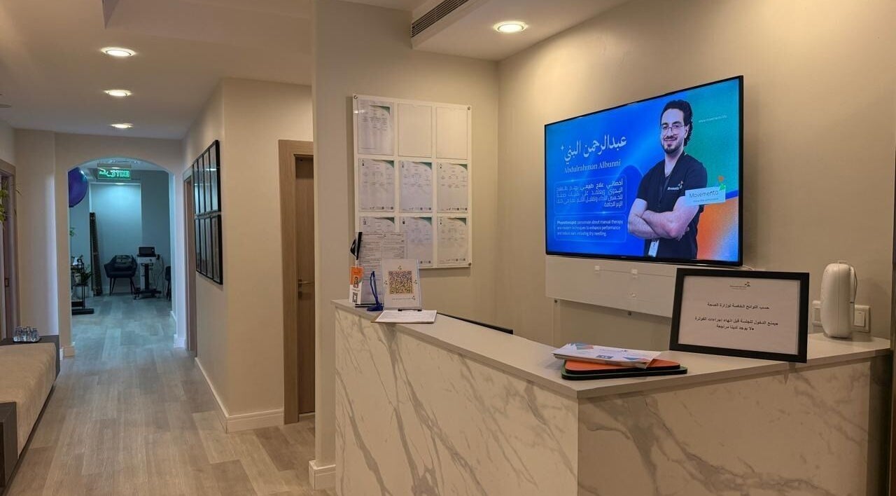 Reception area of Movemento/CRYO Infinity, Jeddah, Makkah Province, SA, featuring modern decor and signage.