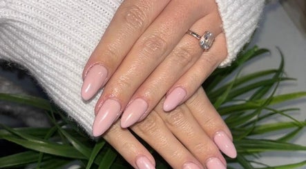 Close-up of manicured hands with soft pink nails at Modern Glow Mc, Gillitts, Kwazulu-natal, ZA.