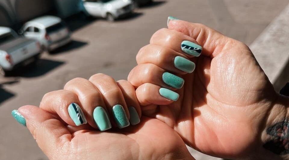 Stylish turquoise nail art at Modern Glow Mc, Gillitts, Kwazulu-natal, ZA showcases creative and modern designs.
