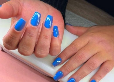 Blue manicured nails at Modern Glow Mc in Gillitts, Kwazulu-natal, ZA, showcasing nail art perfection.