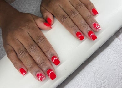 Bold red manicure at Modern Glow Mc, Gillitts, Kwazulu-natal, ZA showcases perfectly polished nails.