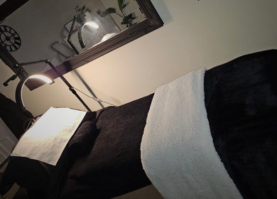 Luxury treatment table at E R Beauty Therapy, Plymouth, England, GB, inviting relaxation.