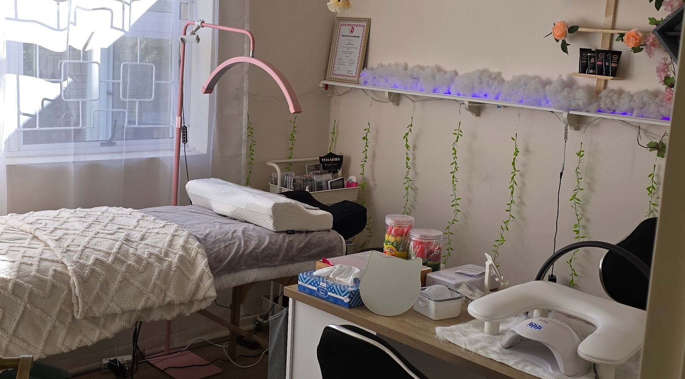 Calm treatment room at Mystic Muse Beauty, Gqeberha, Eastern Cape, ZA with cozy bedding and elegant decor.