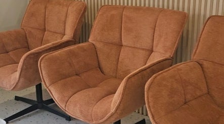 Cozy velvet chairs at BTS Beauty in Centurion, Gauteng, ZA, offering luxurious relaxation.