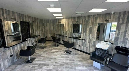 Modern salon interior at Kiera’s Kreations in Bognor Regis, England, GB featuring sleek styling chairs and mirrors.