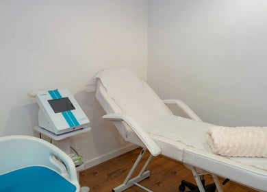 Spa room with massage chair at Ana Wellbeing in Luton, England, GB, offering relaxing wellness services.