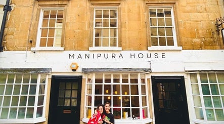 Front view of Manipura House in Bath, England, GB, showcasing its classic architecture.