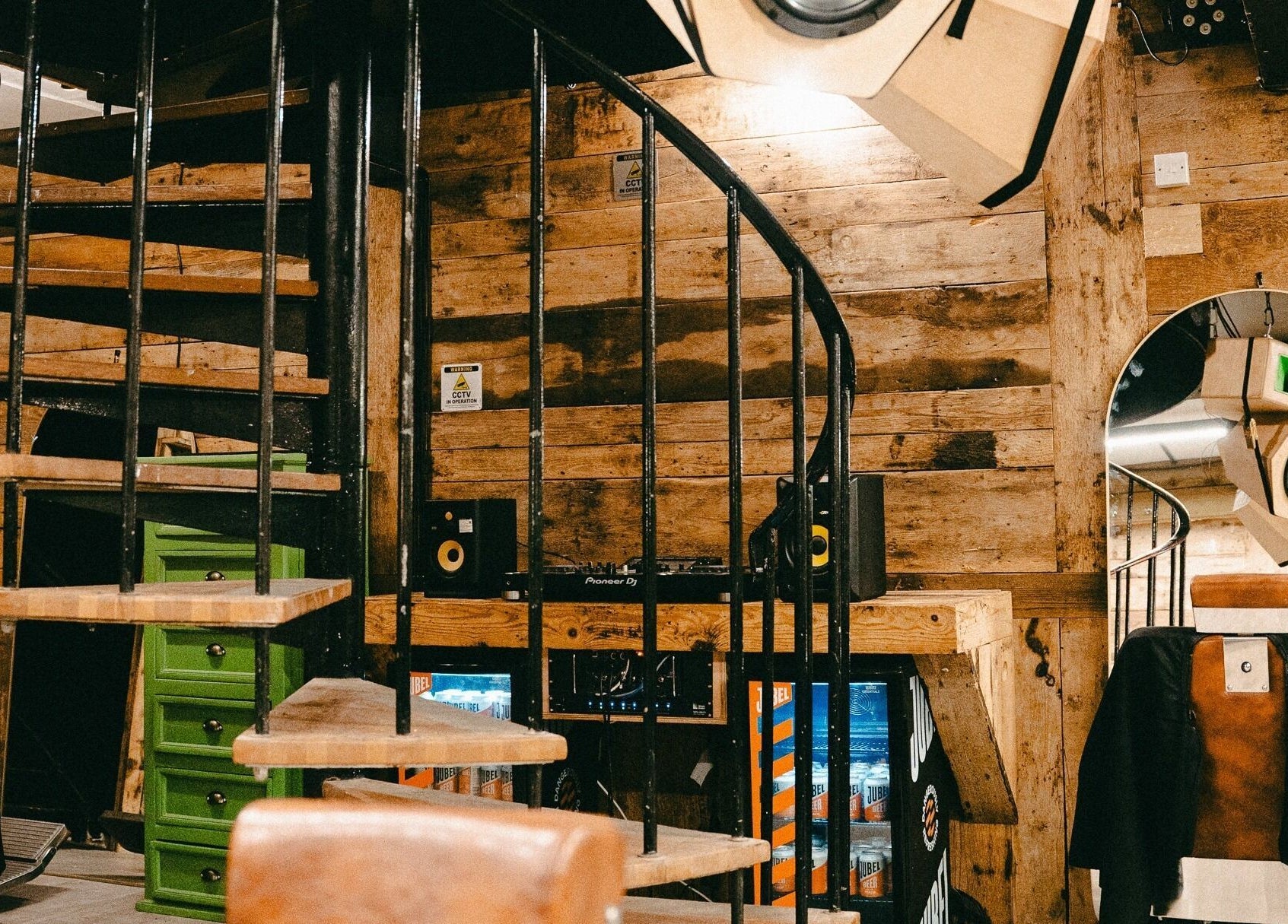 Stylish interior with rustic design at Jacobs Park Street, Bristol, England, GB. Features a wooden spiral stair.