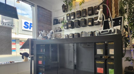 Stylish interior of Hartley Mee Ltd in Southport, England, GB, featuring a variety of hair extension products.