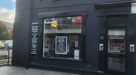 Exterior of Hartley Mee Ltd showing promotional offers in Southport, England, GB.