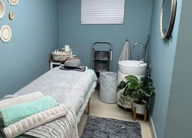 Peaceful treatment room at Treasured Moments in Gillitts, Kwazulu-Natal, ZA with cozy bed and calming decor.