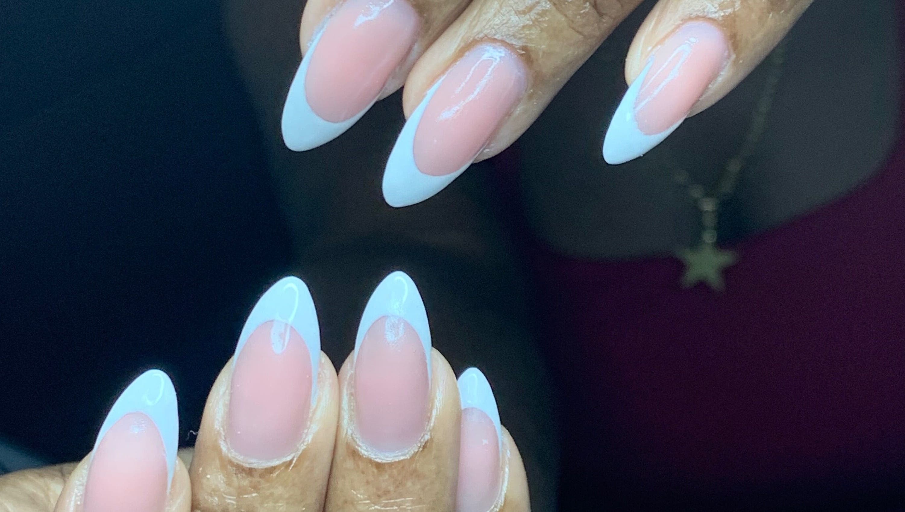 Chic French manicure at Venomcave, Paramaribo, Paramaribo, SR showcasing pink and white nail art.