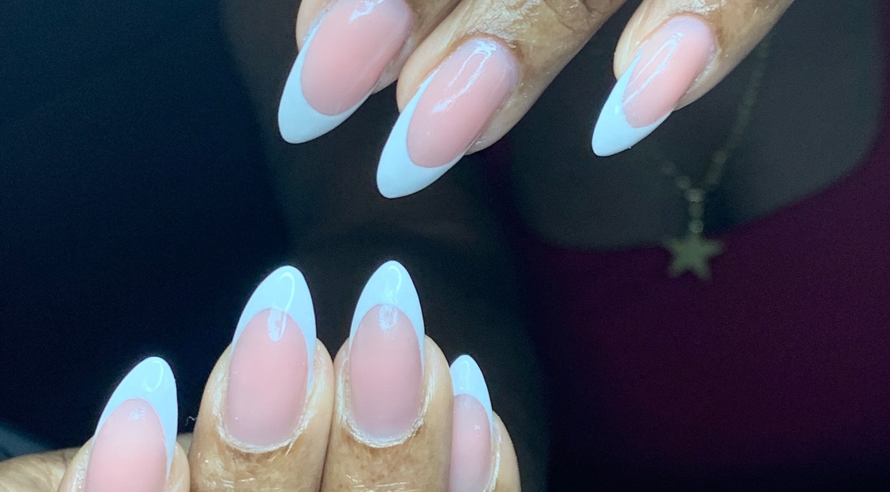 Chic French manicure at Venomcave, Paramaribo, Paramaribo, SR showcasing pink and white nail art.