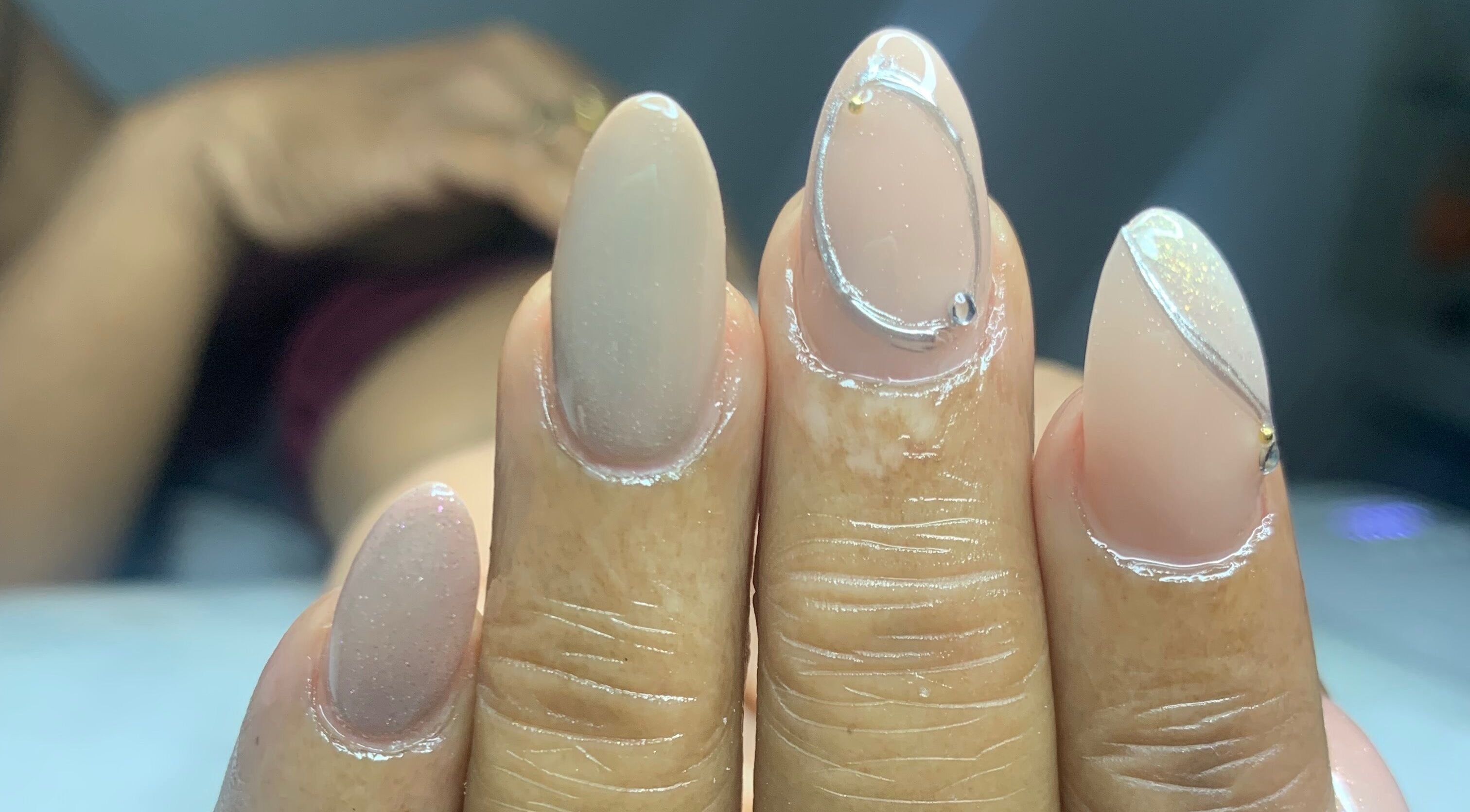 Close-up of elegant manicured nails at Venomcave, Paramaribo, Paramaribo, SR highlighting stylish nail art.