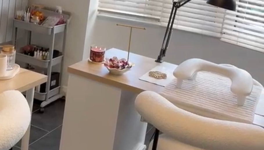 Nail care station at The Nail Studio.By Grace in Nantwich, England, GB with cozy seating and elegant decor.