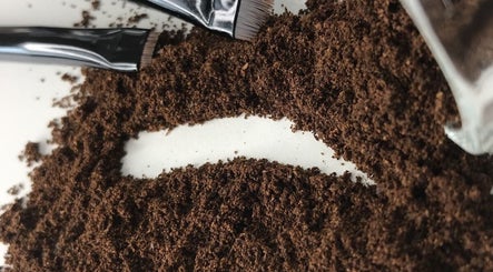Brow powder spread with brushes at Lamoré, Mokopane, Limpopo, ZA, for perfect eyebrow styling.