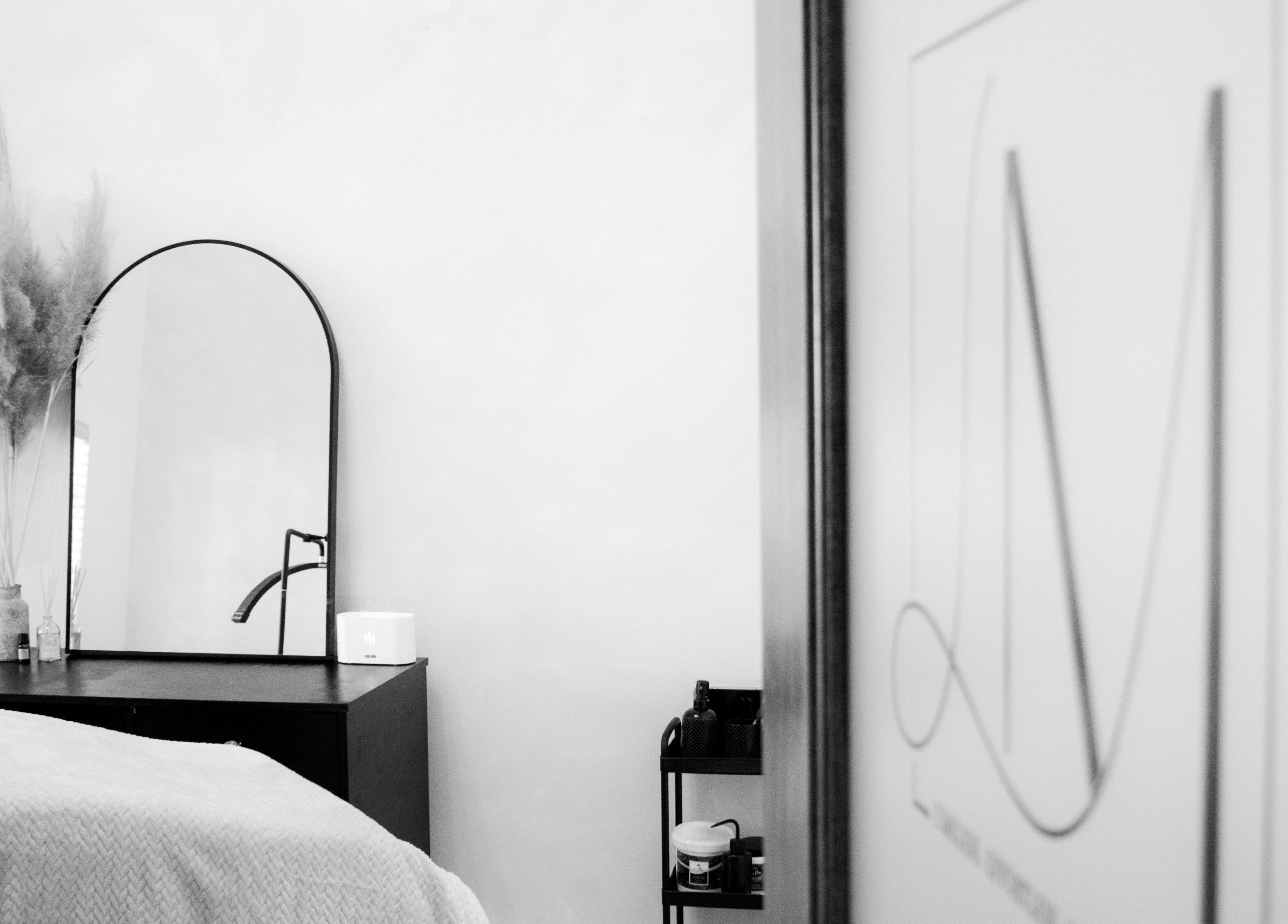 Chic interior of Lamoré, Mokopane, Limpopo, ZA featuring a minimalist aesthetic with a mirror and decor.