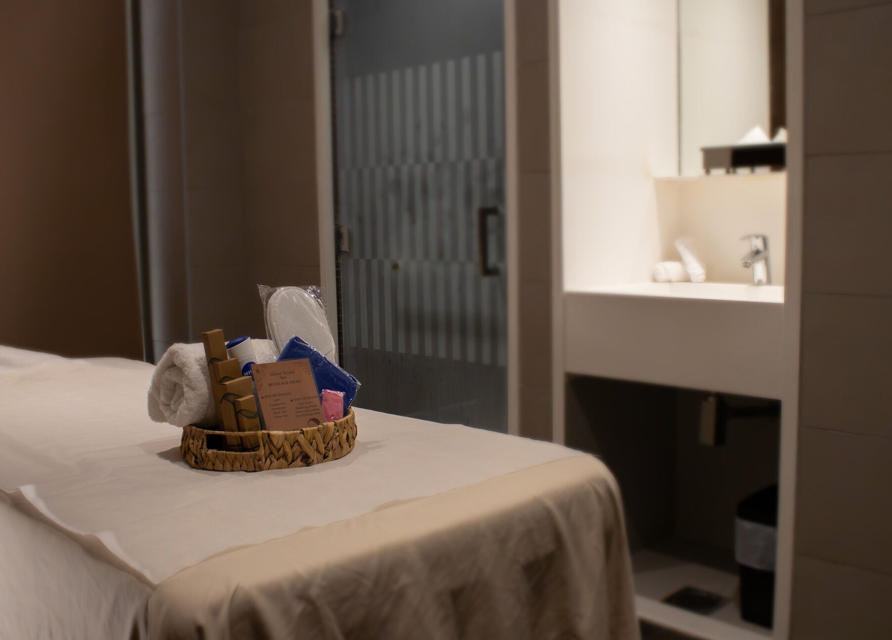 Massage room at Velvet Touch European Spa in Dubai, AE, featuring a luxurious treatment table and relaxation essentials.