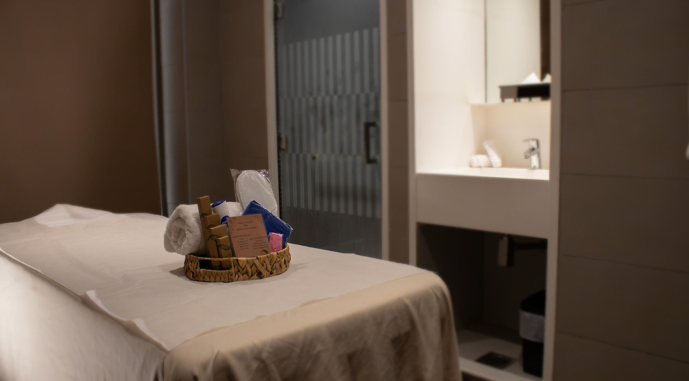 Massage room at Velvet Touch European Spa in Dubai, AE, featuring a luxurious treatment table and relaxation essentials.