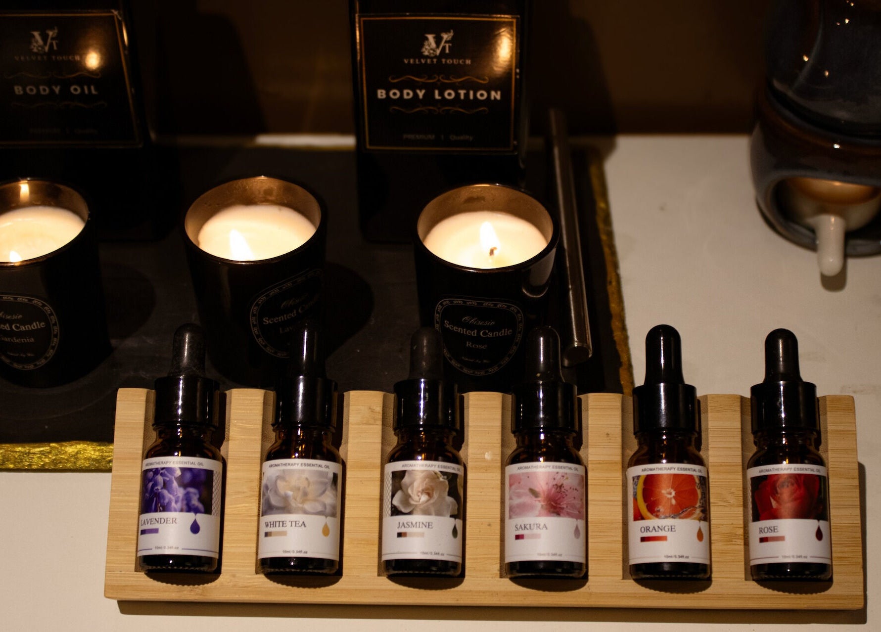 Aromatherapy oils and candles at Velvet Touch European Spa in Dubai, AE, creating a relaxing ambiance.
