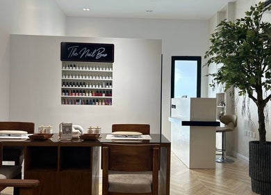 Modern nail bar at Asap Salon in Dammam, Eastern Province, SA featuring elegant decor and nail polish display.