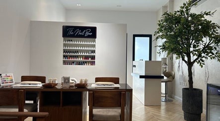Modern nail bar at Asap Salon in Dammam, Eastern Province, SA featuring elegant decor and nail polish display.