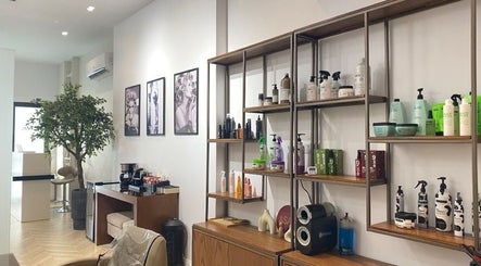 Stylish product shelves at Asap Salon, Dammam, Eastern Province, SA, showcasing a range of beauty essentials.