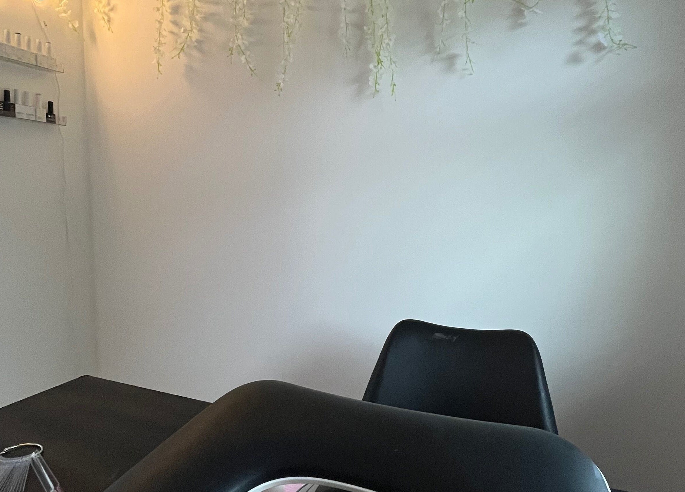 Cozy nail station at Nails by Lily, Horley, England, GB with minimalist decor and soft lighting.