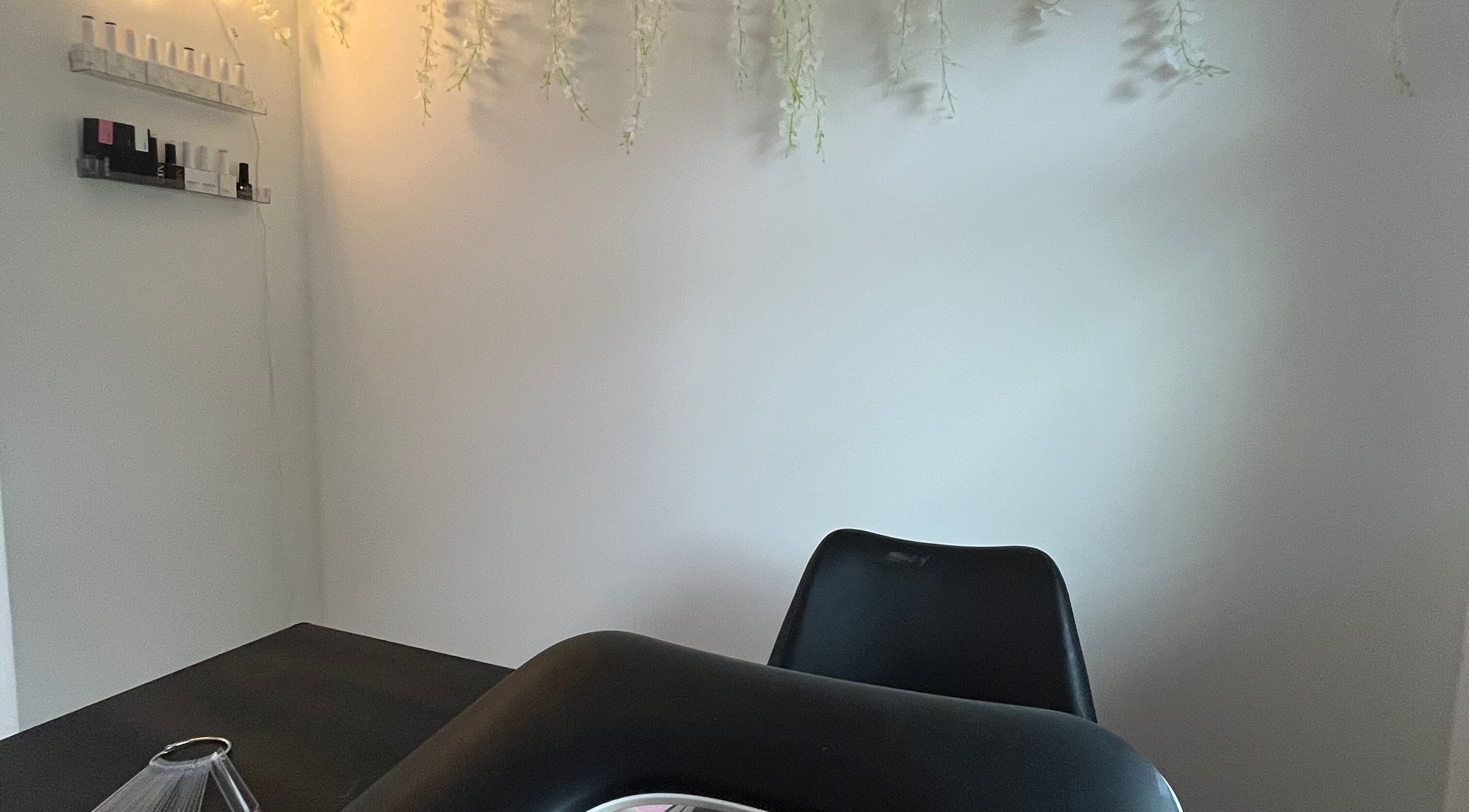 Cozy nail station at Nails by Lily, Horley, England, GB with minimalist decor and soft lighting.