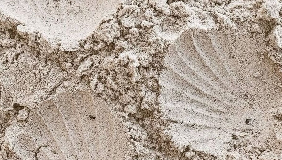 Close-up of textured sand patterns at Looksbygumi, Toronto, Ontario, CA.