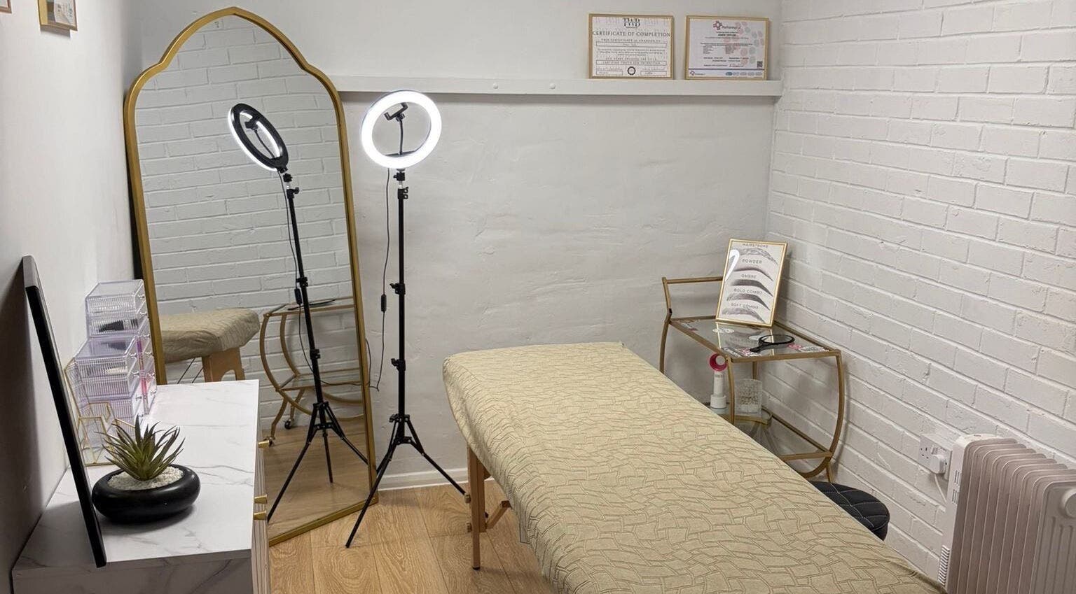 Calming treatment room at BEAUTY CULT, Wellingborough, England, GB with stylish decor and professional lighting.