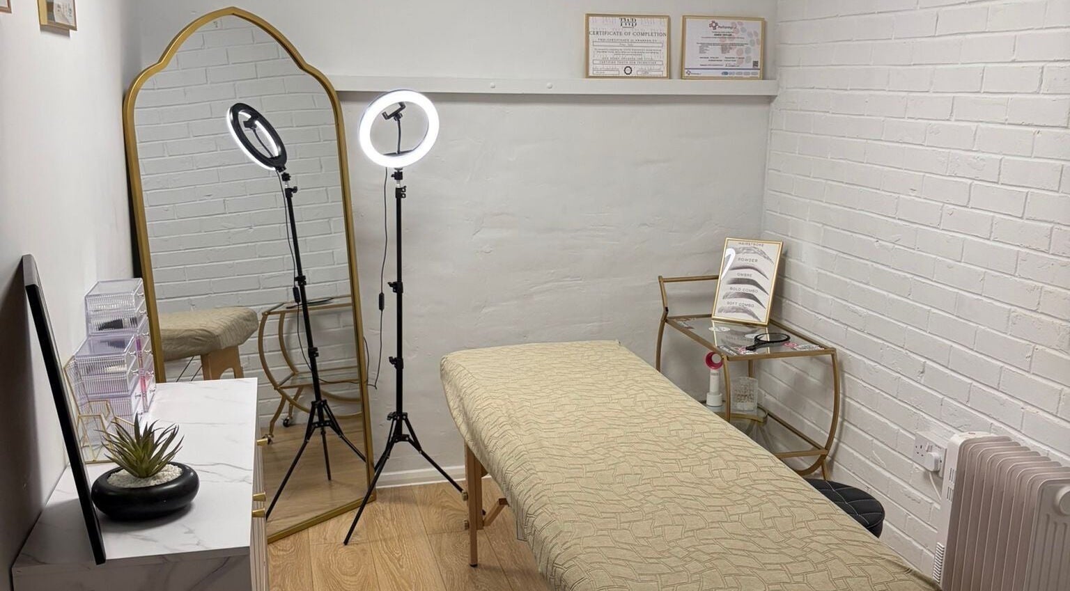 Calming treatment room at BEAUTY CULT, Wellingborough, England, GB with stylish decor and professional lighting.
