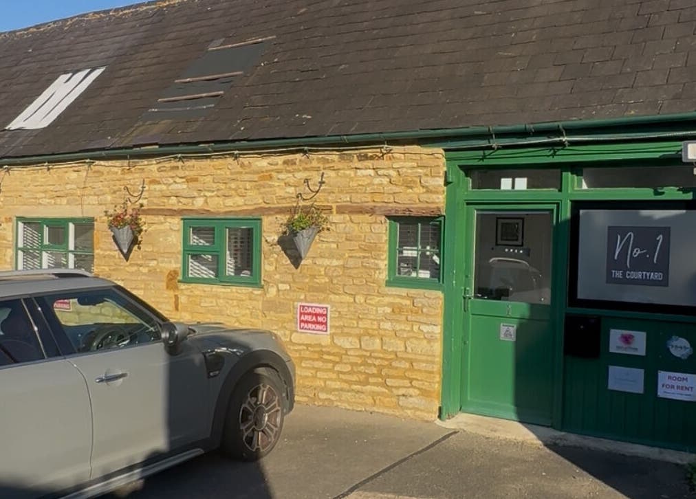 BEAUTY CULT venue exterior in Wellingborough, England, showcasing rustic stone and green accents.