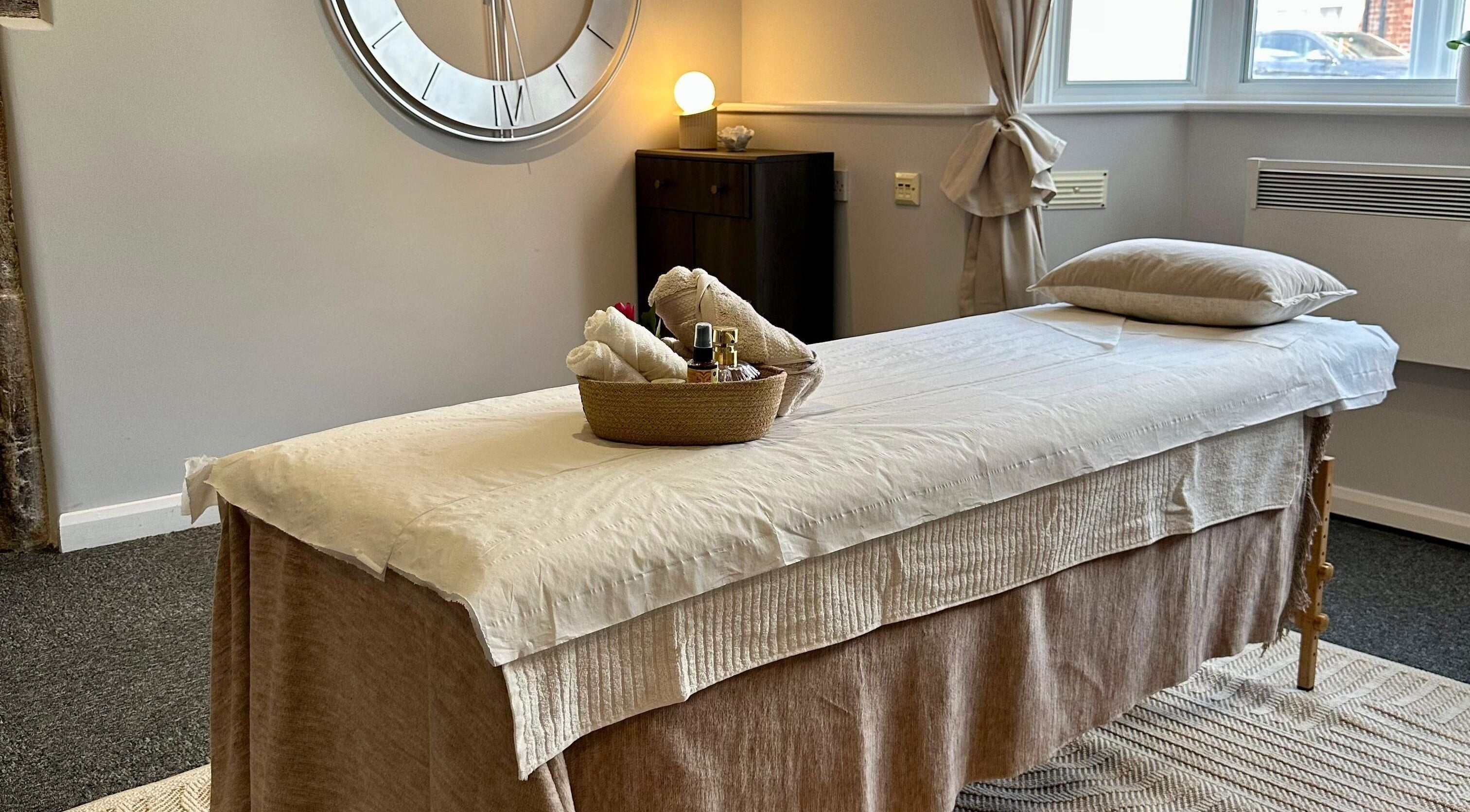 Massage table setup at UThai Massage in Sevenoaks, England, GB, offering a tranquil ambiance.