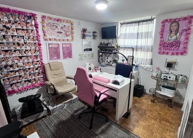 Cozy nail salon interior with pink accents at Mdh Nails in Toronto, Ontario, CA.