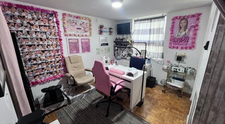 Cozy nail salon interior with pink accents at Mdh Nails in Toronto, Ontario, CA.