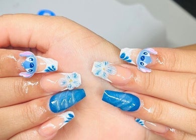 Elegant blue flower nail art at Mdh Nails, Toronto, Ontario, CA. Perfect blend of creativity and style.