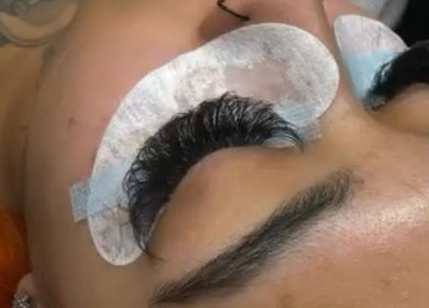 Close-up of eyelash extensions being applied at Barbie Suite Lashes in Oakland, California, US.