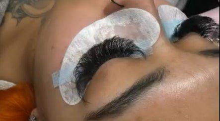 Close-up of eyelash extensions being applied at Barbie Suite Lashes in Oakland, California, US.