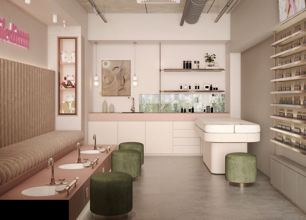 Elegant interior of Nailedittttt - Far East Plaza in Singapore, Singapore, SG, showcasing plush seating and nail polish display.