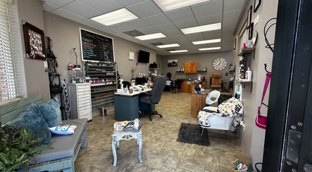 Interior of American Heritage Salon LLC in Firth, Idaho, US, showcasing stylish decor and nail polish display.