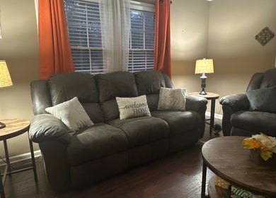 Comfortable seating area at Beam Me Up, New Johnsonville, Tennessee, with soft lighting and welcoming decor.
